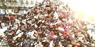 a huge pile of old shoes