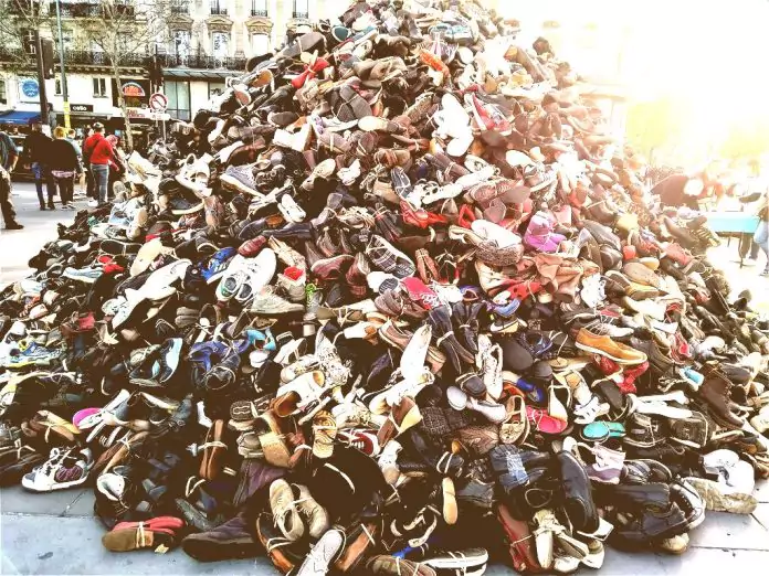 a huge pile of old shoes